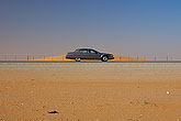 Car in a desert highway Saudi Arabia