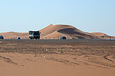 Dunes behind highway Saudi Arabia