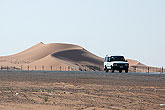 Dunes behind highway Saudi Arabia