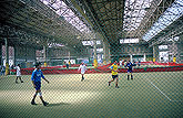 Football players in a hangar